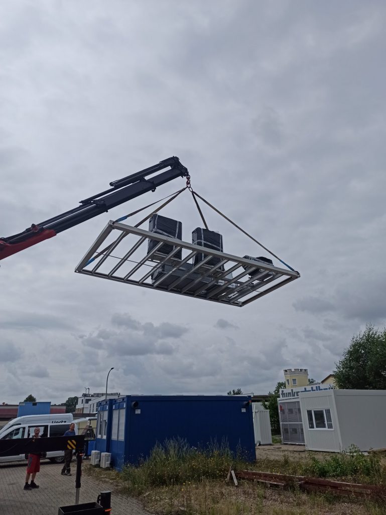 HVAC Frame for modular container laboratory in air with crane.